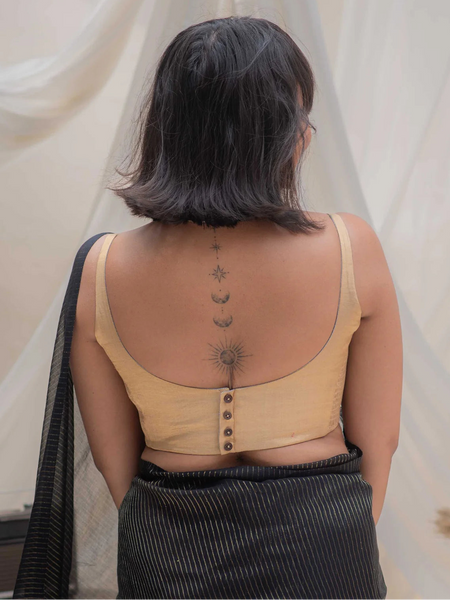 Reversible sleeveless padded U-neck blouse in plain gold cotton silk and striped grey-white cotton with stretchable versatile blouse