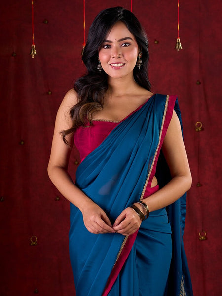 Deep Teal Silk Blend Saree Adorned with Magenta Border & Intricately Embroidered Pallu