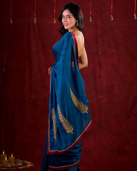 Deep Teal Silk Blend Saree Adorned with Magenta Border & Intricately Embroidered Pallu