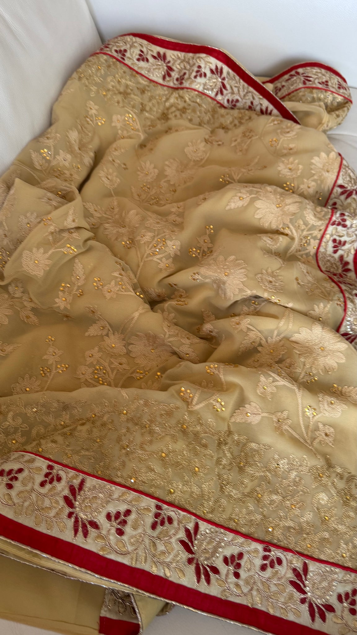 Sandy Off White Georgette Silk Saree with Red Border