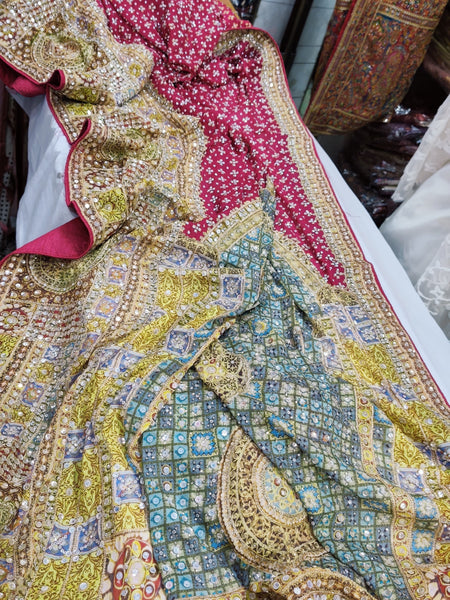 Rani Pink and Pastel Multicolor Border Saree