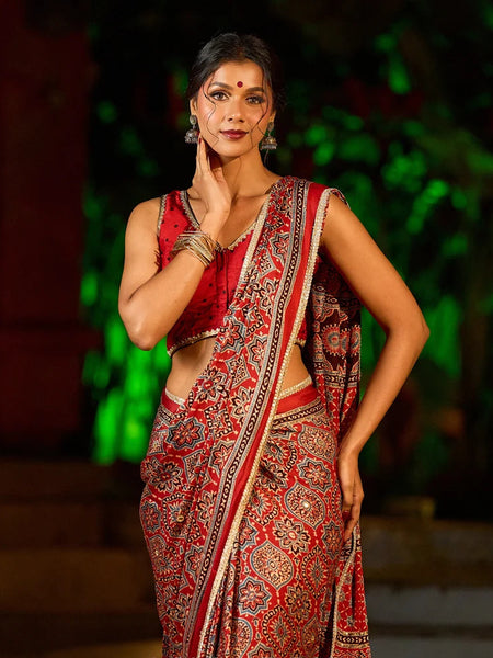 Maroon Modal Silk Saree with Traditional Ajrakh Print & Contrast Gold Lace Detail & Hand Embroidered Pallu