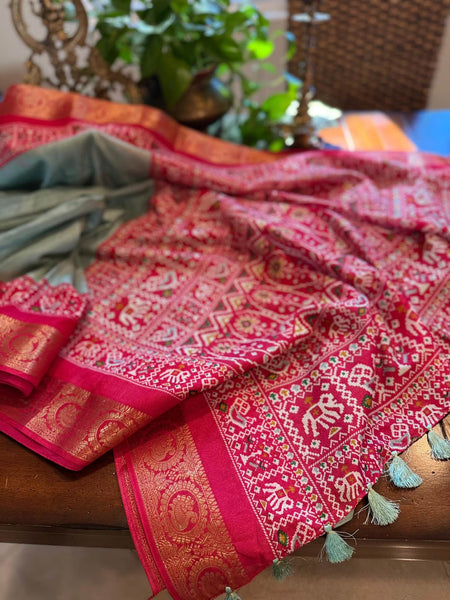 Mint Green and Hot Pink Patola print matka tussar silk cotton fabric with embossed design