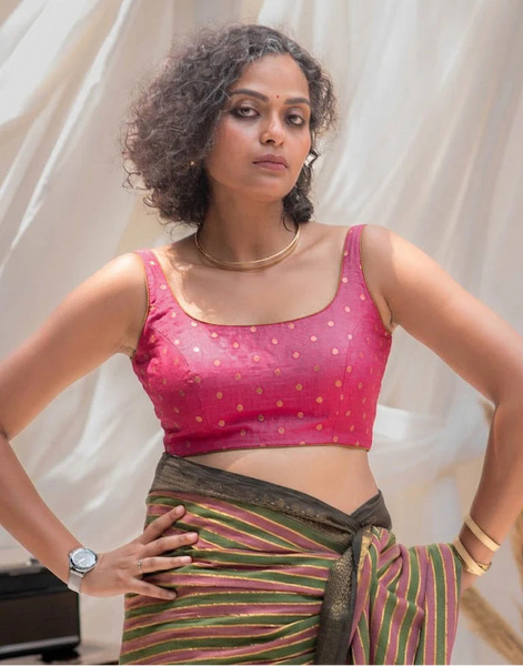 Reversible sleeveless padded U-neck blouse in pink buti and plain olive viscose with stretchable versatile blouse