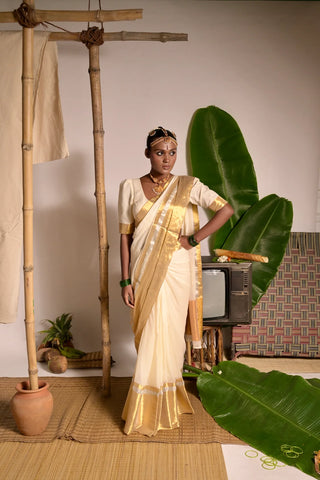 Off white mul cotton handwoven saree with golden border