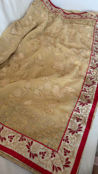 Sandy Off White Georgette Silk Saree with Red Border