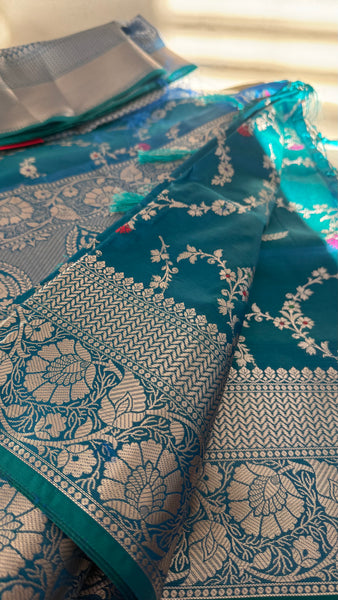 PEACOCK BLUE FLORAL SILK SAREE with SILVER ZARI BORDER