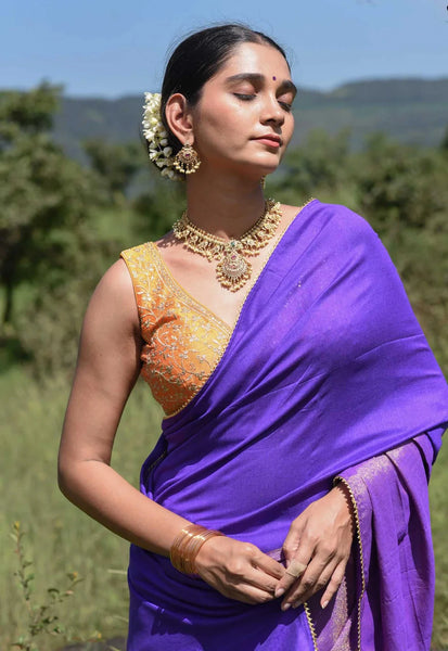 Blue and gold half-and-half saree with gold scallop lace