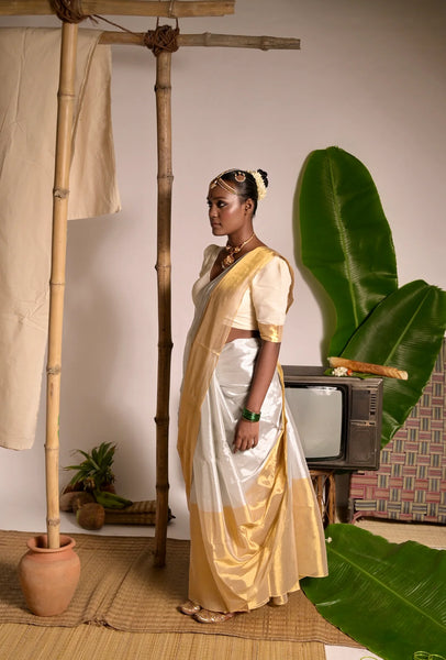 Off white mul cotton handwoven saree with golden border