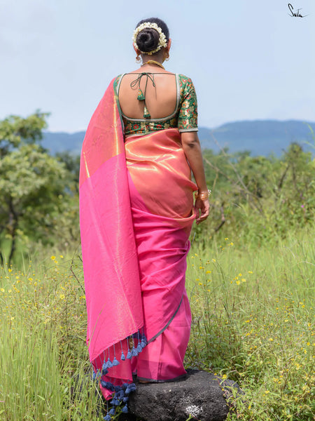 Elegant pink and gold half-and-half cotton-acrylic saree with zari-striped pallu