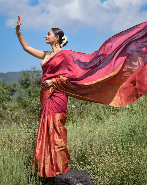Maroon and gold half-and-half saree with Gota patti and Samosa lace