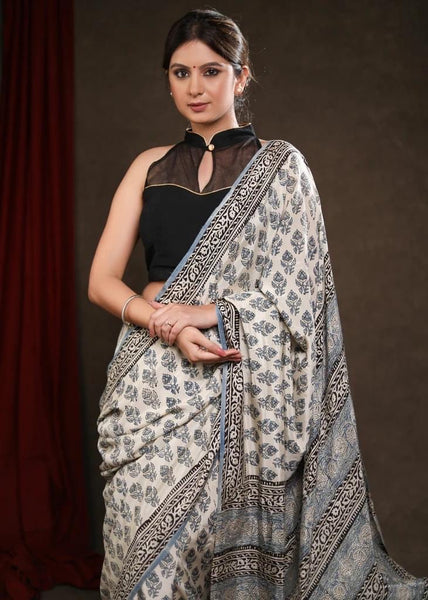 FAKIRA PRINT CREAM & LIGHT BLUE MODAL SAREE