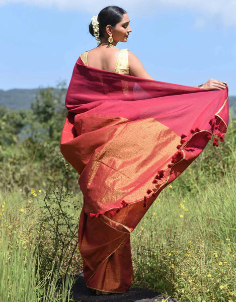 Maroon and gold half-and-half saree with Gota patti and Samosa lace