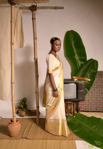 Off white mul cotton handwoven saree with golden border