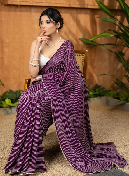 WINE GEORGETTE SAREE WITH BEAUTIFUL OVERALL SEQUENCED CROCHET