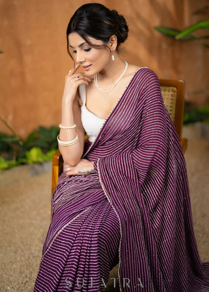 WINE GEORGETTE SAREE WITH BEAUTIFUL OVERALL SEQUENCED CROCHET