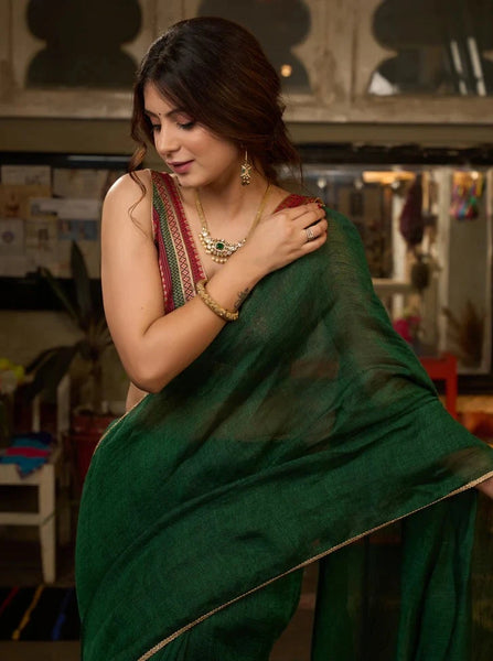 BOTTLE GREEN COTTON SAREE HIGHLIGHTED WITH GOLDEN LACE