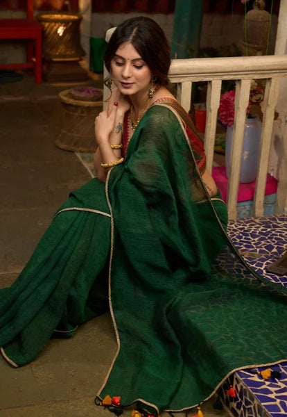 BOTTLE GREEN COTTON SAREE HIGHLIGHTED WITH GOLDEN LACE