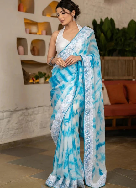 SKY BLUE TIE & DYE ORGANZA SAREE HIGHLIGHTED WITH MATCHING CROCHET LACE