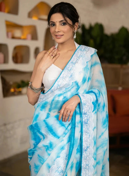 SKY BLUE TIE & DYE ORGANZA SAREE HIGHLIGHTED WITH MATCHING CROCHET LACE