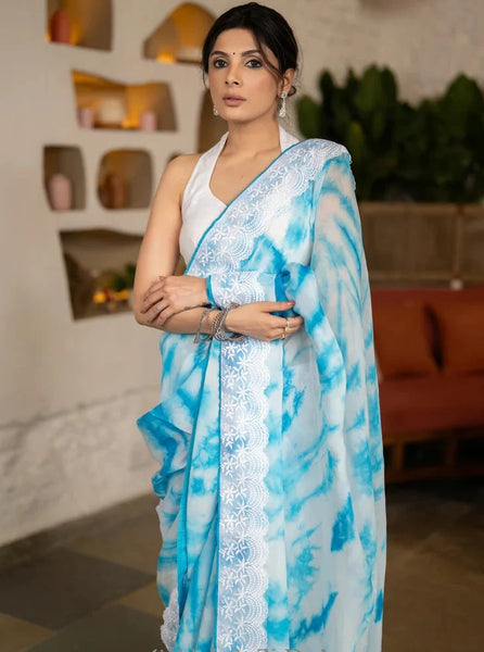 SKY BLUE TIE & DYE ORGANZA SAREE HIGHLIGHTED WITH MATCHING CROCHET LACE