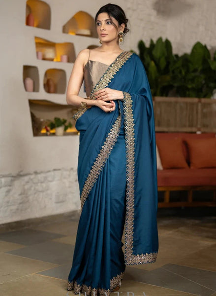 TEAL MUSLIN SAREE HIGHLIGHTED WITH BEAUTIFUL MATCHING LACE