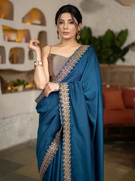 TEAL MUSLIN SAREE HIGHLIGHTED WITH BEAUTIFUL MATCHING LACE