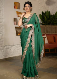 BOTTLE GREEN ORGANZA SAREE HIGHLIGHTED WITH MATCHING SCALLOPED LACE