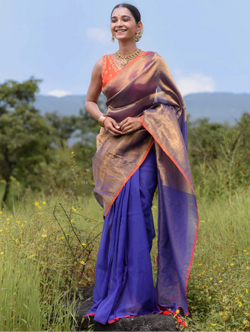 Half-and-half blue and gold zari saree with striped pallu