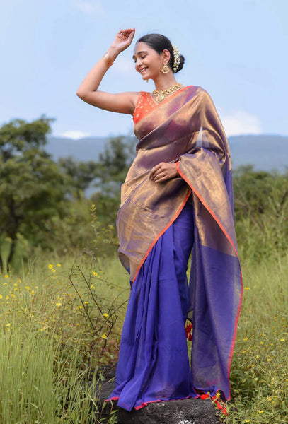Half-and-half blue and gold zari saree with striped pallu