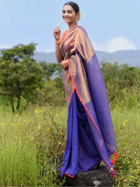 Half-and-half blue and gold zari saree with striped pallu