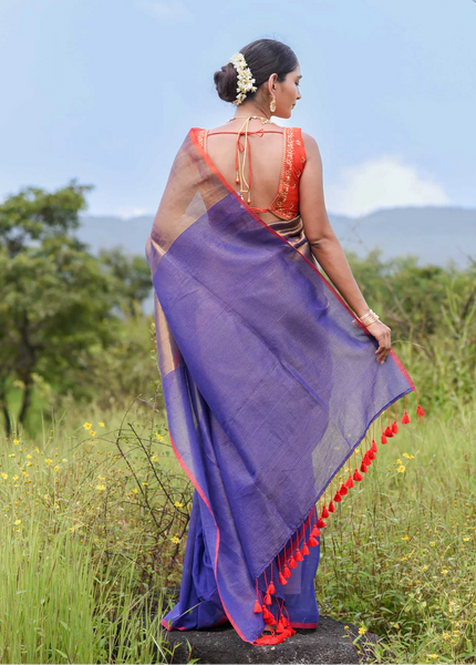 Half-and-half blue and gold zari saree with striped pallu
