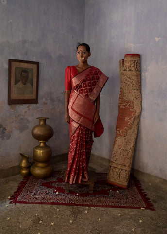 Red Handloom silk Jaal Banarasi Saree with floral Zari Border