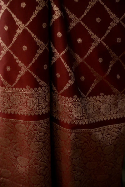 Red Handloom silk Jaal Banarasi Saree with floral Zari Border