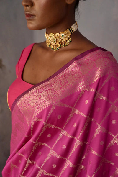 Rani pink Handloom silk Jaal Banarasi Saree with floral Zari Border