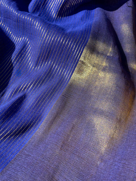 Half-and-half blue and gold zari saree with striped pallu