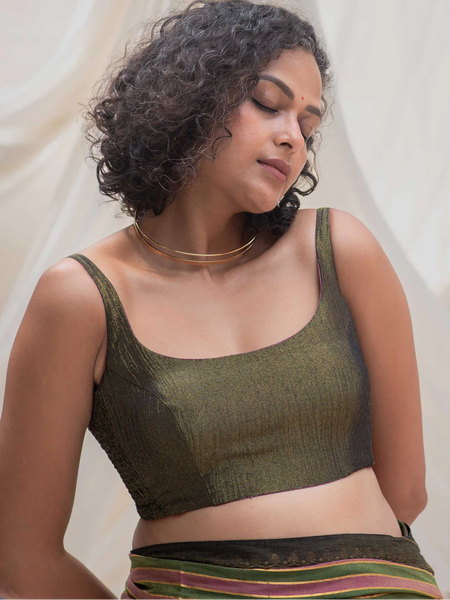 Reversible sleeveless padded U-neck blouse in pink buti and plain olive viscose with stretchable versatile blouse