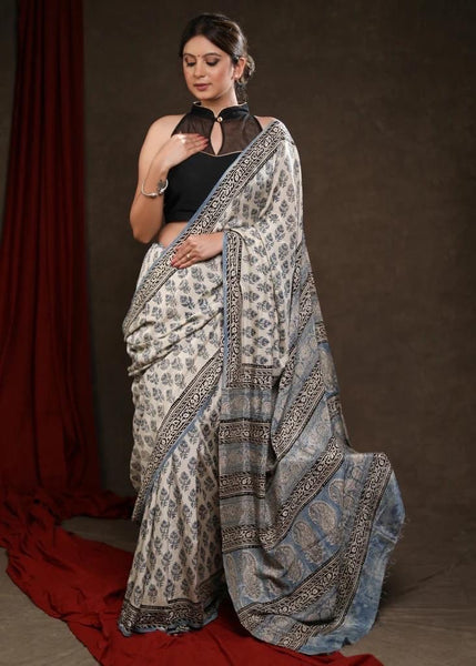FAKIRA PRINT CREAM & LIGHT BLUE MODAL SAREE
