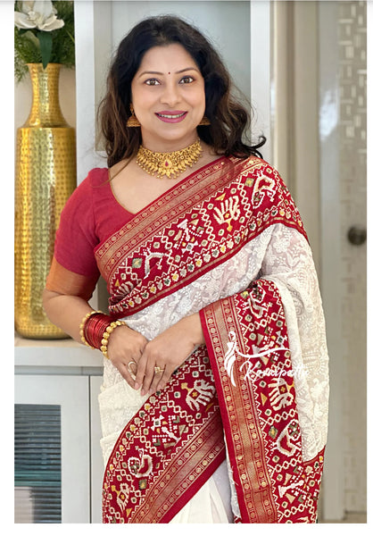 Red and White Georgette saree with lucknowi work on all over the saree
