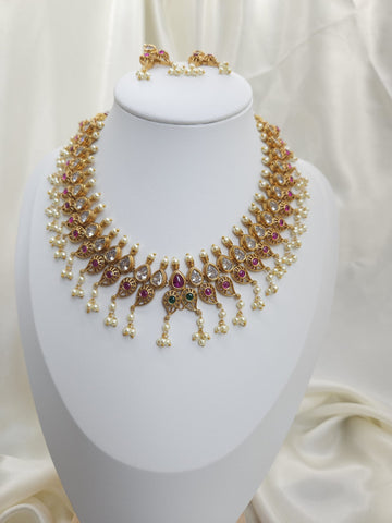 Aarvi goldplated contemporary Necklace set with Multicolor Stonework
