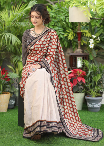 CREAM COTTON SAREE WITH PRINTED PALLU AND HIGHLIGHTED WITH AJRAKH BORDER