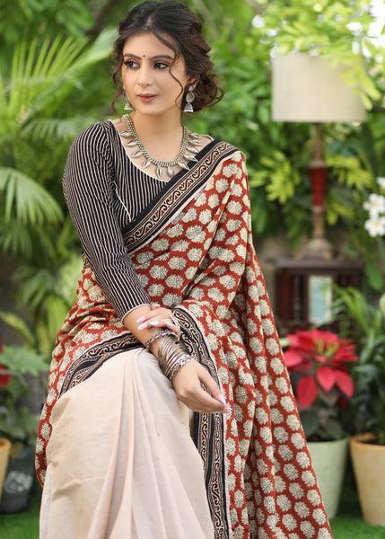 CREAM COTTON SAREE WITH PRINTED PALLU AND HIGHLIGHTED WITH AJRAKH BORDER