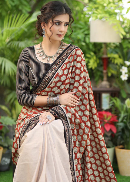 CREAM COTTON SAREE WITH PRINTED PALLU AND HIGHLIGHTED WITH AJRAKH BORDER