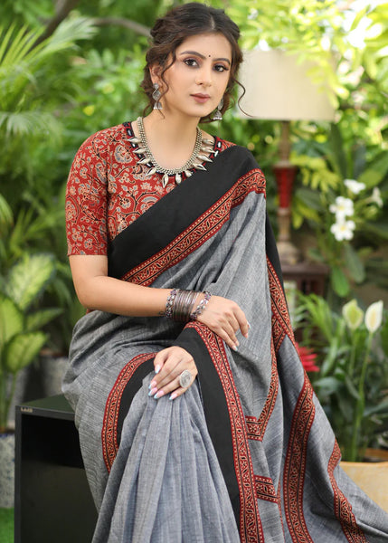 SLATE GREY COTTON SAREE WITH BEAUTIFUL AJRAKH LINES IN THE PALLU HIGHLIGHTED WITH BLACK BORDER