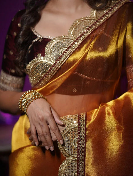 Fiery Gold Zari Tissue Mehraab Border Saree