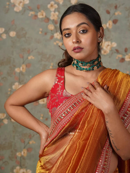 Fiery Gold Zari Tissue Saree with Red Border