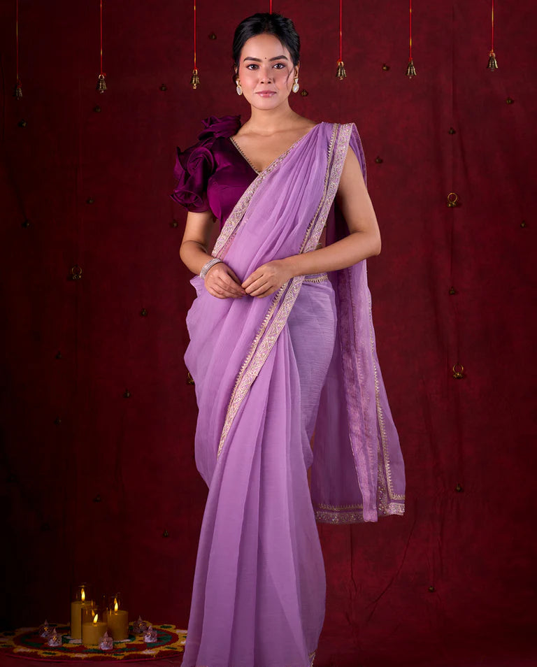 Lavender Crepe Saree Adorned with Delicate Embroidered Lace Border
