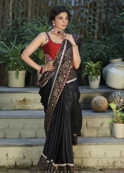 BLACK MODAL SILK SAREE WITH GOLDEN BORDER HIGHLIGHTED WITH LACE