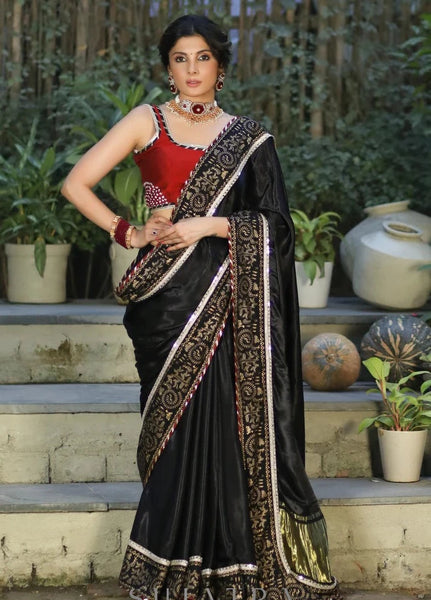 BLACK MODAL SILK SAREE WITH GOLDEN BORDER HIGHLIGHTED WITH LACE