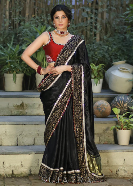 BLACK MODAL SILK SAREE WITH GOLDEN BORDER HIGHLIGHTED WITH LACE